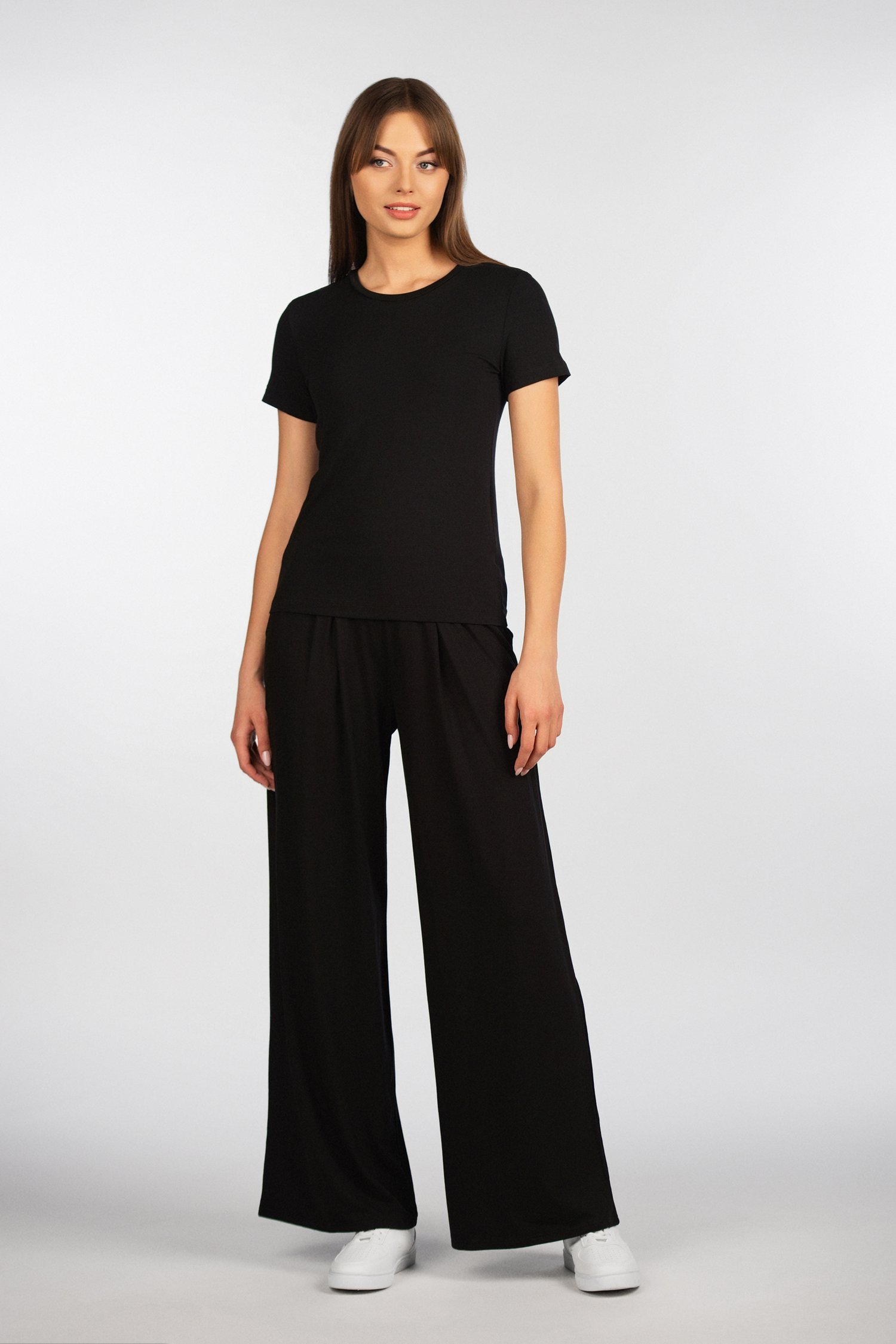 Plačios kelnės su kišenėmis